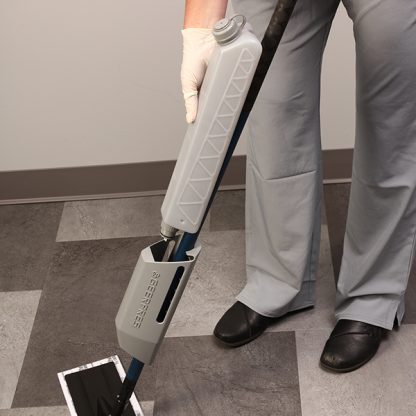 Person removing tank on G8 Mop System